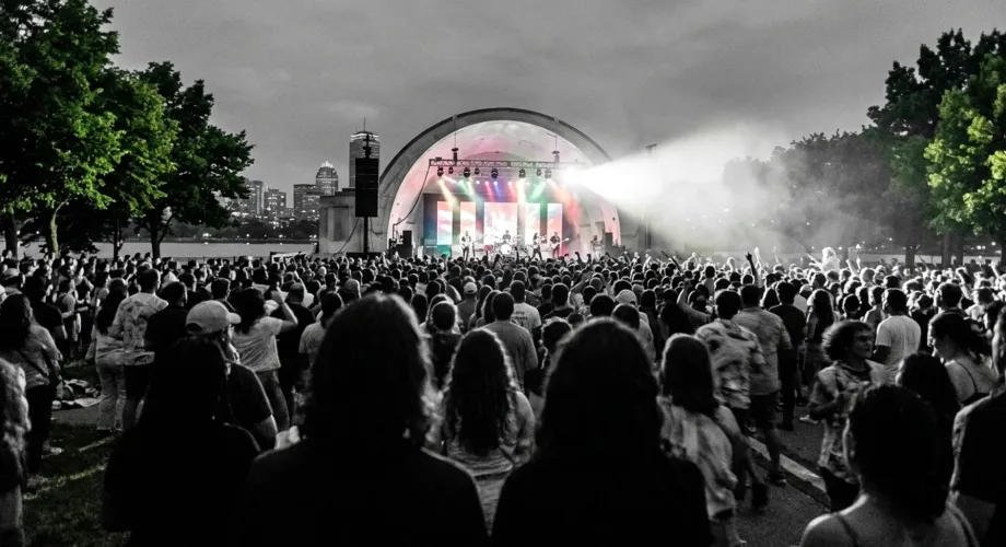Crowd silhouettes at a Hatch Shell concert, one of the fun things to do at Boston's Charles River Esplanade