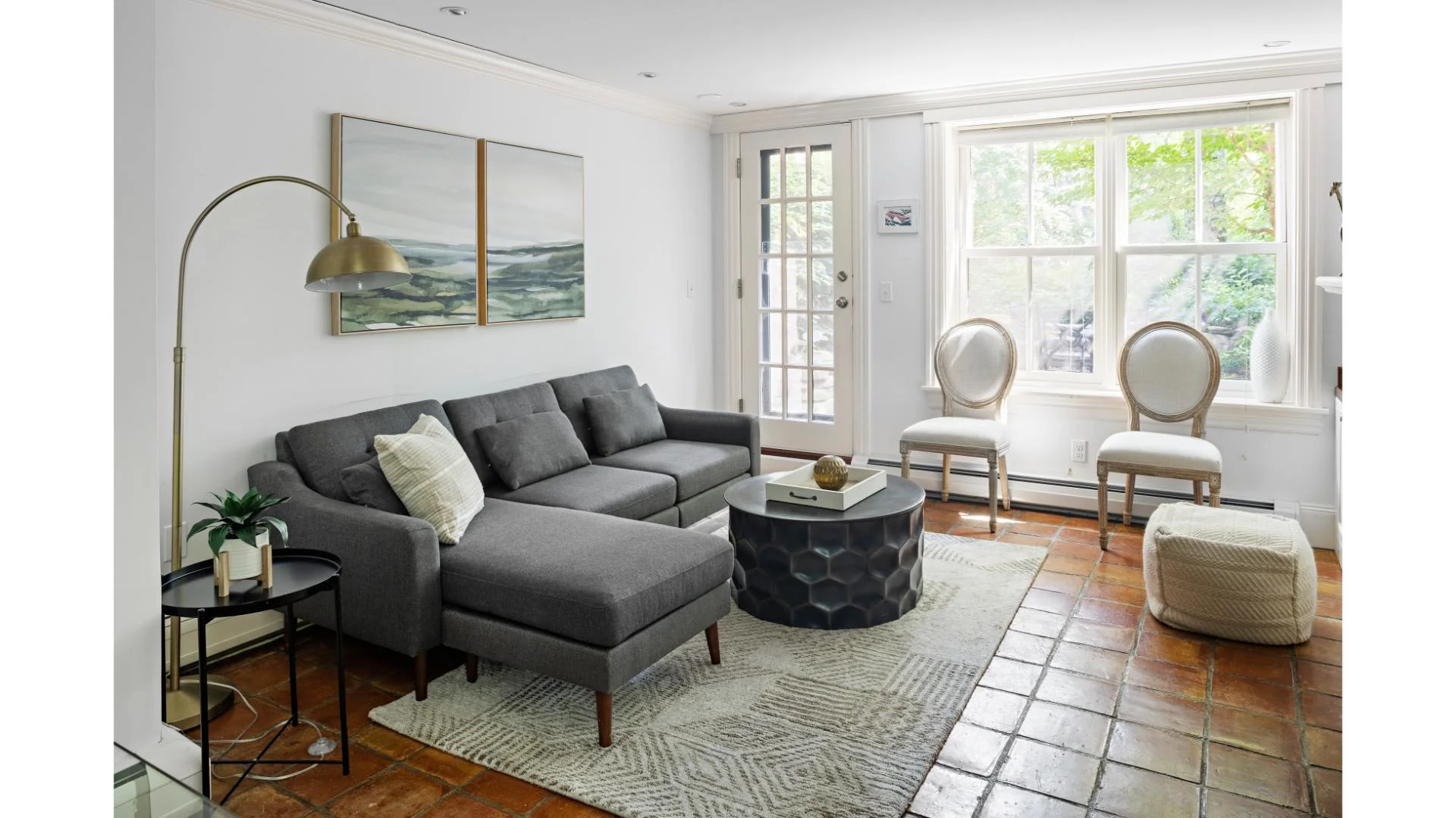 Living room with French doors to a private patio, a calm base after the best hikes near Boston
